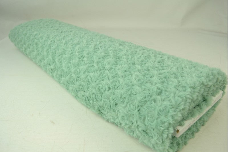 Bont stof met rozenpatroon – Mintgroen